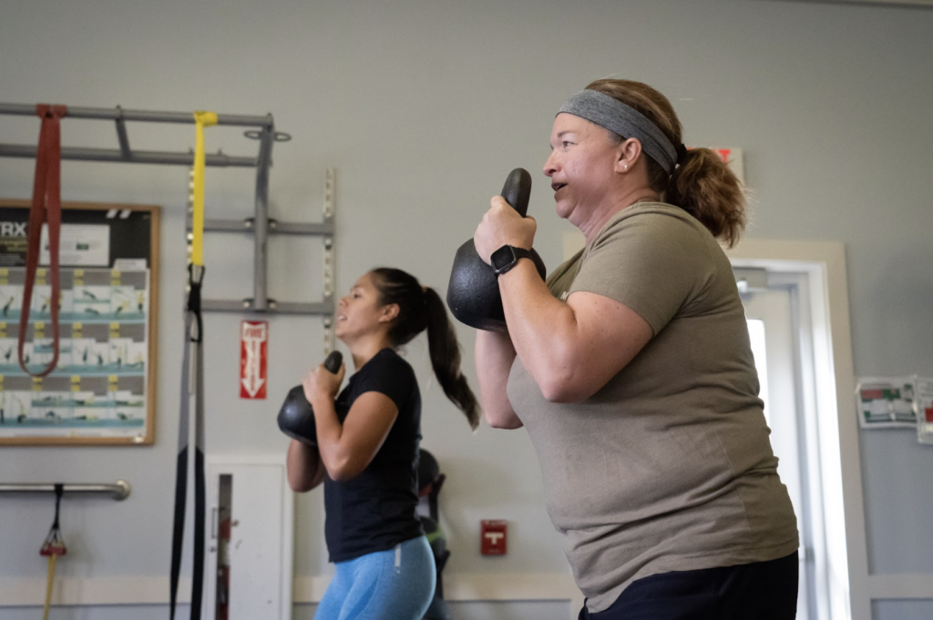 Person taking part in a strength training class